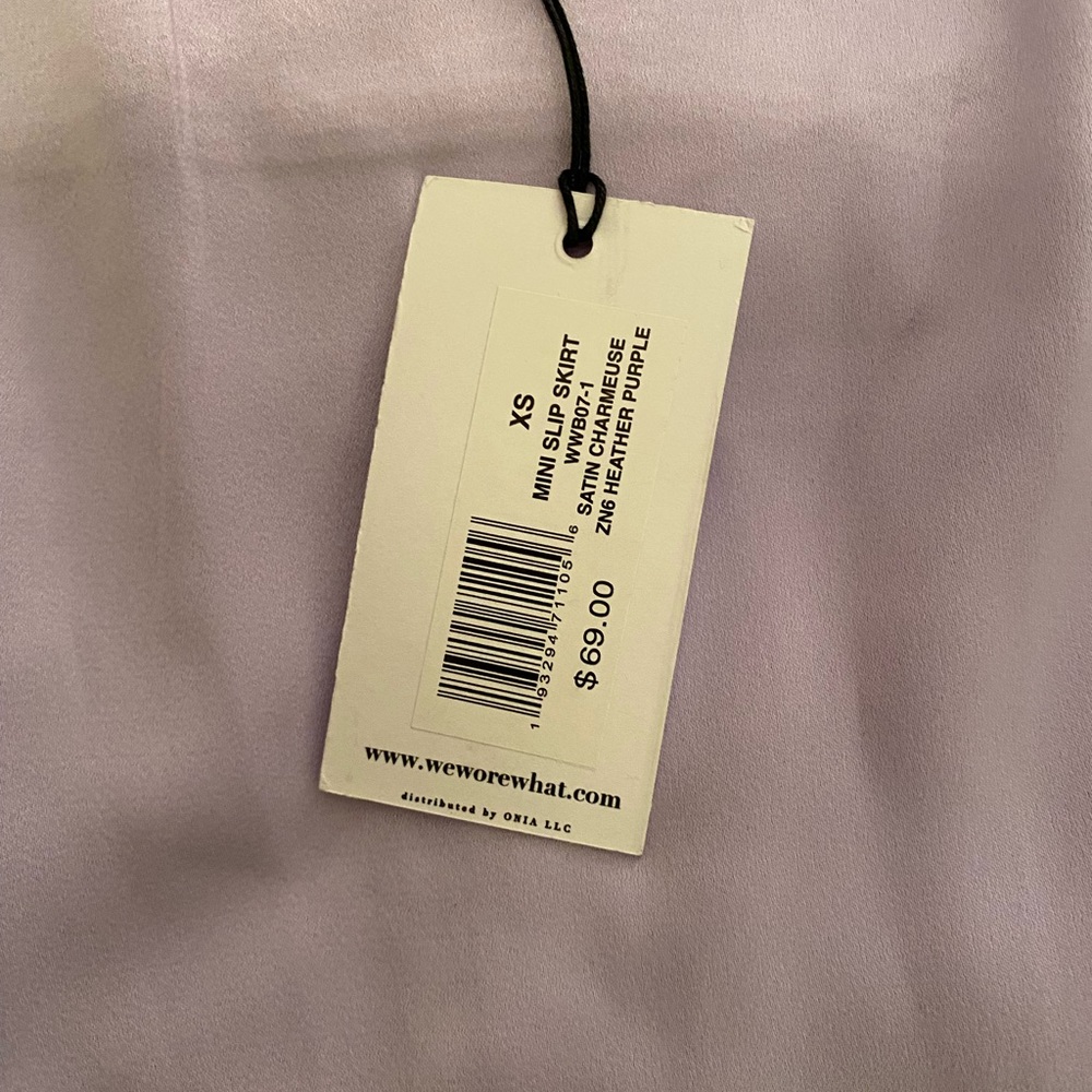 New with tags size extra small. We wore what satin charmeuse
